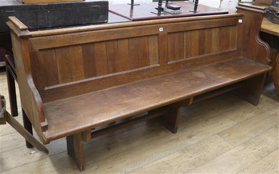 An oak pew, W.209cm